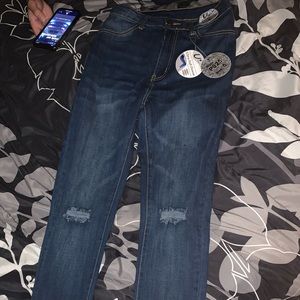 High waisted dark skinny jeans.